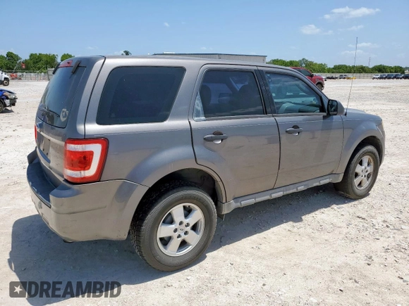 2009 Ford Escape XLS with VIN 1FMCU02739KC12318, listed as a Copart auction lot 61251485 with 179,335 mi miles and Salvage title. Bid and sale history available at DreamBid. Image 3.