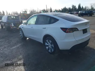 2024 Tesla Model Y Long Range with VIN 7SAYGDEE1RF056816, listed as a IAAI auction lot 41809125 with 6,434 mi miles and . Bid and sale history available at DreamBid. Image 3.