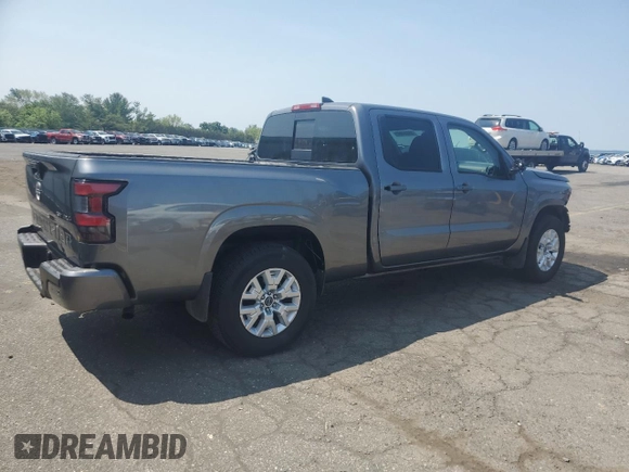 2024 Nissan Frontier SV with VIN 1N6ED1FKXRN605620, listed as a Copart auction lot 59854695 with 8,828 mi miles and Salvage title. Bid and sale history available at DreamBid. Image 3.