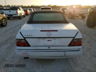 1995 Mercedes-Benz E Class with VIN WDBEA66E0SC275229, listed as a Copart auction lot 77391894 with 64,025 mi miles and Salvage Title. Bid and sale history available at carsss.com. Image 6.