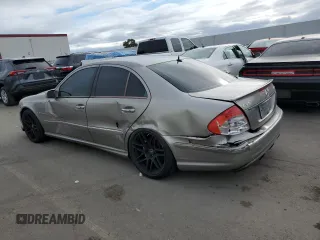 2005 Mercedes-Benz E-Class 5.5L AMG with VIN WDBUF76J15A768563, listed as a Copart auction lot 46345505 with 108,947 mi miles and Salvage Title. Bid and sale history available at carsss.com. Image 2.