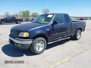 2000 Ford F-150 XL with VIN 1FTRX18LXYNB41132, listed as a IAAI auction lot 42173717 with Not provided miles and . Bid and sale history available at DreamBid. Image 2.
