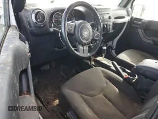 2016 Jeep Wrangler Willys Wheeler z VIN 1C4AJWAG4GL243285, wystawiony jako Copart lot #58035425 z przebiegiem 100 251 mil mil oraz Szkoda całkowita • Salvage title. Historia ofert i sprzedaży dostępna na DreamBid. Obrazek 8.