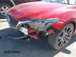 2017 Mazda 6 Grand Touring with VIN JM1GL1W52H1139776, listed as a IAAI auction lot 41671005 with 40,884 mi miles and . Bid and sale history available at DreamBid. Image 6.