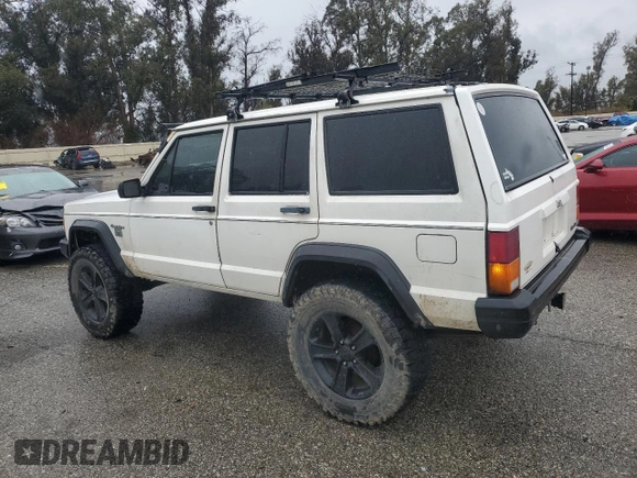 1989 Jeep Cherokee z VIN 1J4FT28LXKL601505, wystawiony jako Copart lot #49312265 z przebiegiem 264 769 mil mil oraz Szkoda całkowita • Salvage title. Historia ofert i sprzedaży dostępna na DreamBid. Obrazek 2.