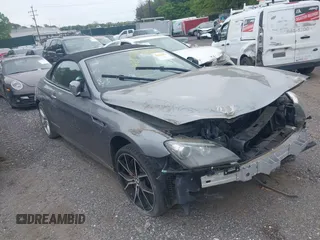 2015 BMW M6 z VIN WBSLZ9C57FD651313, wystawiony jako IAAI lot #42375727 z przebiegiem 45 132 mil mil oraz . Historia ofert i sprzedaży dostępna na DreamBid. Obrazek 1.