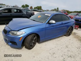 2016 BMW 2 Series M235i xDrive with VIN WBA1J9C52GV372057, listed as a Copart auction lot 71236354 with 89,420 mi miles and Salvage Title. Bid and sale history available at carsss.com. Image 1.