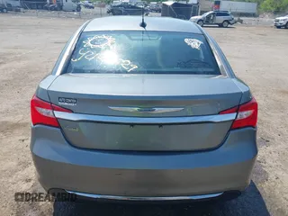 2012 Chrysler 200 Touring with VIN 1C3CCBBGXCN326023, listed as a IAAI auction lot 42126529 with 163,325 mi miles and . Bid and sale history available at carsss.com. Image 16.