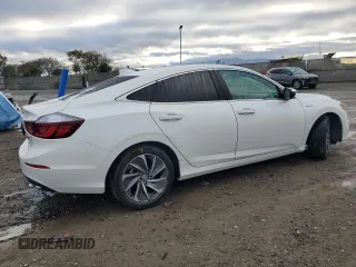 2021 Honda Insight Touring with VIN 19XZE4F96ME009546, listed as a Copart auction lot 48487045 with 60,446 mi miles and Salvage Title. Bid and sale history available at carsss.com. Image 3.
