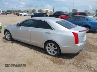 2014 Cadillac ATS Standard RWD with VIN 1G6AA5RA1E0104839, listed as a IAAI auction lot 42383432 with 142,701 mi miles and . Bid and sale history available at DreamBid. Image 3.