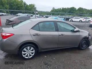 2018 Toyota Corolla L with VIN 2T1BURHE9JC990834, listed as a IAAI auction lot 42583027 with 217,143 mi miles and . Bid and sale history available at DreamBid. Image 13.