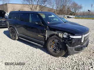 2023 Rivian R1S Adventure with VIN 7PDSGABA3PN012584, listed as a Copart auction lot 47557575 with 8,633 mi miles and Salvage Title. Bid and sale history available at carsss.com. Image 4.