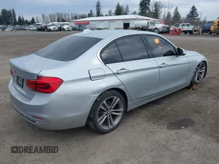 2017 BMW 3 Series 330i xDrive with VIN WBA8D9G33HNU64889, listed as a IAAI auction lot 41626253 with 66,520 mi miles. Bid and sale history available at carsss.com. Image 4.
