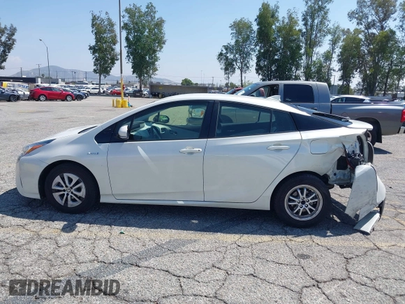 2016 Toyota Prius Four with VIN JTDKARFUXG3511034, listed as a IAAI auction lot 42137394 with 77,424 mi miles. Bid and sale history available at carsss.com. Image 14.