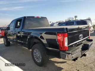 2017 Ford F-250 XL with VIN 1FT7W2A67HED56391, listed as a Copart auction lot 49100395 with 76,050 mi miles and Salvage title. Bid and sale history available at DreamBid. Image 2.