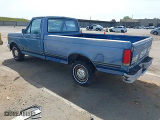 1990 Ford 1/2 Ton Trucks with VIN 1FTDF15N1LPA17475, listed as a IAAI auction lot 42045890 with 5,891 mi miles. Bid and sale history available at carsss.com. Image 3.