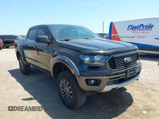 2021 Ford Ranger XL with VIN 1FTER4FH1MLD87968, listed as a IAAI auction lot 42023612 with 64,565 mi miles. Bid and sale history available at carsss.com. Image 1.