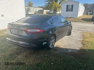 2015 Ford Fusion Energi Titanium with VIN 3FA6P0SU8FR284661, listed as a Copart auction lot 78322934 with 151,859 mi miles and Clean Title. Bid and sale history available at carsss.com. Image 4.