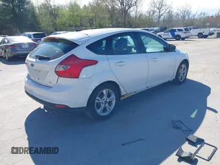 2013 Ford Focus SE with VIN 1FADP3K27DL128775, listed as a IAAI auction lot 42119223 with 138,846 mi miles. Bid and sale history available at carsss.com. Image 4.