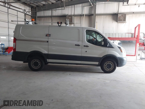 2016 Ford Transit Cargo z VIN 1FTYR1YM7GKB55438, wystawiony jako IAAI lot #42497571 z przebiegiem 66 612 mil mil oraz . Historia ofert i sprzedaży dostępna na DreamBid. Obrazek 14.