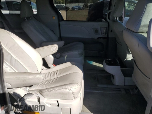 2012 Toyota Sienna XLE z VIN 5TDDK3DC5CS033868, wystawiony jako Copart lot #74727814 z przebiegiem 98 798 mil mil oraz Szkoda całkowita • Salvage title. Historia ofert i sprzedaży dostępna na DreamBid. Obrazek 10.