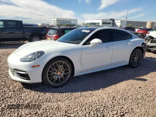 2018 Porsche Panamera 4S с VIN WP0AB2A72JL132540, выставлен на аукционе Copart как лот 77697904 с пробегом 19 637 миль миль и Списание • Salvage title. История ставок и продаж доступна на DreamBid. Изображение 1.