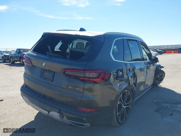 2021 BMW X5 xDrive40i with VIN 5UXCR6C09M9G00150, listed as a IAAI auction lot 41647528 with 1 mi miles. Bid and sale history available at carsss.com. Image 4.