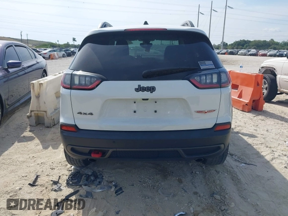 2019 Jeep Cherokee Trailhawk Elite with VIN 1C4PJMBN3KD487461, listed as a IAAI auction lot 41869751 with 91,197 mi miles and . Bid and sale history available at DreamBid. Image 17.