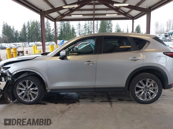 2020 Mazda CX-5 Grand Touring with VIN JM3KFADM0L0738693, listed as a IAAI auction lot 41725906 with 63,629 mi miles. Bid and sale history available at carsss.com. Image 15.