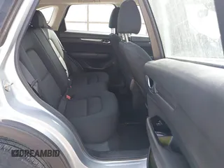 2019 Mazda CX-5 Sport with VIN JM3KFBBM6K1582760, listed as a IAAI auction lot 41822152 with 60,620 mi miles and . Bid and sale history available at DreamBid. Image 8.