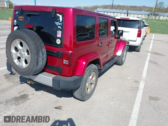 2013 Jeep Wrangler Unlimited Sahara с VIN 1C4BJWEG5DL569977, выставлен на аукционе IAAI как лот 41980394 с пробегом 145 571 миль миль и . История ставок и продаж доступна на DreamBid. Изображение 4.