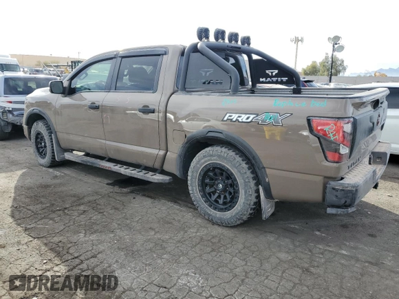 2024 Nissan Titan Pro-4X with VIN 1N6AA1ED3RN103011, listed as a Copart auction lot 87050954 with 8,829 mi miles and Salvage title. Bid and sale history available at DreamBid. Image 2.
