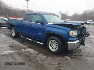 2017 GMC Sierra 1500 SLE z VIN 1GTV2MEC4HZ214619, wystawiony jako IAAI lot #41522006 z przebiegiem 184 513 mil mil oraz . Historia ofert i sprzedaży dostępna na DreamBid. Obrazek 1.