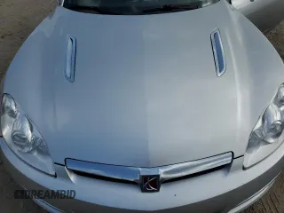 2007 Saturn Sky z VIN 1G8MB35B57Y135858, wystawiony jako Copart lot #57312395 z przebiegiem 46 140 mil mil oraz Szkoda całkowita • Salvage title. Historia ofert i sprzedaży dostępna na DreamBid. Obrazek 11.