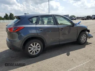 2016 Mazda CX-5 Sport z VIN JM3KE2BY4G0632946, wystawiony jako Copart lot #61447435 z przebiegiem 178 492 mil mil oraz Szkoda całkowita • Salvage title. Historia ofert i sprzedaży dostępna na DreamBid. Obrazek 3.