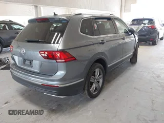 2020 Volkswagen Tiguan SE z VIN 3VV3B7AX0LM007612, wystawiony jako IAAI lot #42275320 z przebiegiem 44 254 mil mil oraz . Historia ofert i sprzedaży dostępna na DreamBid. Obrazek 4.