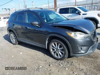 2014 Mazda CX-5 Grand Touring with VIN JM3KE2DY7E0405115, listed as a IAAI auction lot 41939899 with 147,452 mi miles. Bid and sale history available at carsss.com. Image 1.