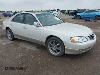2001 Mazda Millenia S z VIN JM1TA222811710618, wystawiony jako IAAI lot #42292915 z przebiegiem 69 444 mil mil oraz . Historia ofert i sprzedaży dostępna na DreamBid. Obrazek 1.