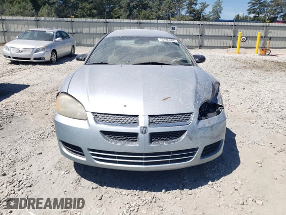 2004 Dodge Stratus SXT z VIN 4B3AG42G64E146011, wystawiony jako Copart lot #70186364 z przebiegiem 184 795 mil mil oraz Szkoda całkowita • Salvage title. Historia ofert i sprzedaży dostępna na DreamBid. Obrazek 5.