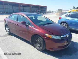2012 Honda Civic LX z VIN 19XFB2F56CE084744, wystawiony jako IAAI lot #42077087 z przebiegiem 177 263 mil mil oraz . Historia ofert i sprzedaży dostępna na DreamBid. Obrazek 1.