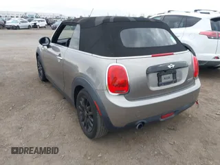 2016 MINI Convertible z VIN WMWWG5C51G3A81075, wystawiony jako IAAI lot #41681717 z przebiegiem 54 956 mil mil oraz . Historia ofert i sprzedaży dostępna na DreamBid. Obrazek 3.