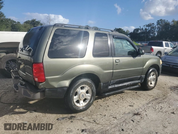 2003 Ford Explorer Sport XLS z VIN 1FMYU60EX3UA56154, wystawiony jako Copart lot #82259834 z przebiegiem 188 417 mil mil oraz Szkody całkowita. Historia ofert i sprzedaży dostępna na DreamBid. Obrazek 3.