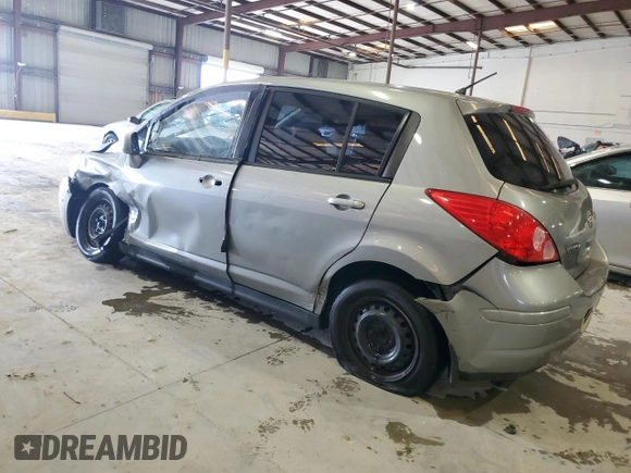 2012 Nissan Versa S with VIN 3N1BC1CP3CK202541, listed as a Copart auction lot 70234934 with 214,607 mi miles and Salvage Title. Bid and sale history available at carsss.com. Image 2.
