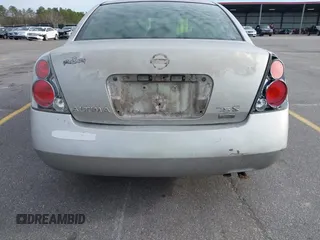2006 Nissan Altima 2.5 S with VIN 1N4AL11D36C217672, listed as a IAAI auction lot 41749484 with 185,010 mi miles. Bid and sale history available at carsss.com. Image 13.