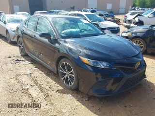 2018 Toyota Camry LE z VIN 4T1B11HKXJU652275, wystawiony jako IAAI lot #42245625 z przebiegiem 49 596 mil mil oraz . Historia ofert i sprzedaży dostępna na DreamBid. Obrazek 1.