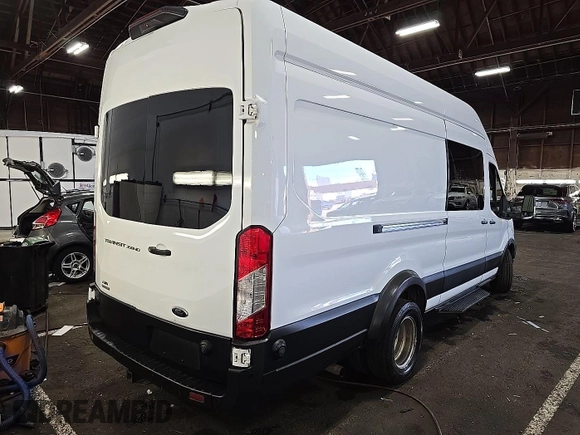 2020 Ford Transit Cargo with VIN 1FTBF4UG0LKB26146, listed as a IAAI auction lot 42679323 with 137,541 mi miles and . Bid and sale history available at DreamBid. Image 12.
