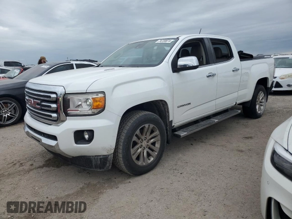 2017 GMC Canyon 2WD SLT z VIN 1GTG5DE13H1235684, wystawiony jako Copart lot #74739974 z przebiegiem Nie podano mil oraz Szkoda całkowita • Salvage title. Historia ofert i sprzedaży dostępna na DreamBid. Obrazek 1.