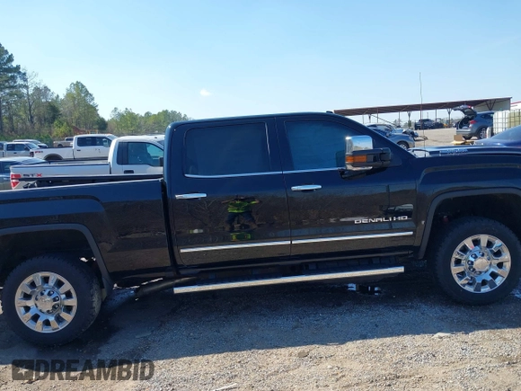 2019 GMC Sierra 2500HD Denali with VIN 1GT12SEY3KF207121, listed as a IAAI auction lot 38782753 with 87,337 mi miles. Bid and sale history available at carsss.com. Image 14.
