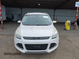 2013 Ford Escape SEL with VIN 1FMCU0H99DUB83641, listed as a IAAI auction lot 41578882 with 124,872 mi miles. Bid and sale history available at carsss.com. Image 12.
