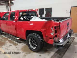 2018 Chevrolet Silverado 1500 LT with VIN 1GCRCREH4JZ164236, listed as a IAAI auction lot 41394225 with 64,639 mi miles and . Bid and sale history available at DreamBid. Image 3.